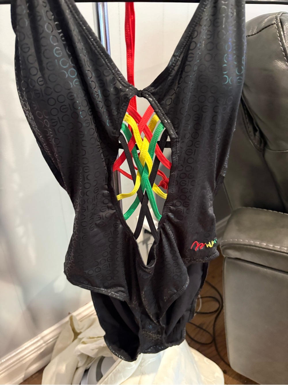 COOGI Black Bathing suit with Red, Yellow & Green Woven middle with shiny black